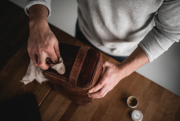 leather care by rubbing with finger